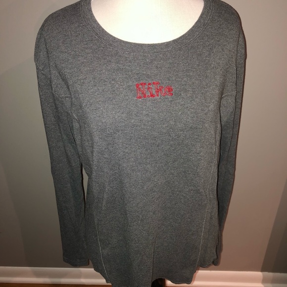 Gray Nike long sleeve shirt w/red Nike letters